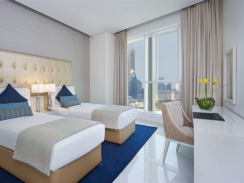 Damac Maison The Vogue Dubai Exteriör bild A guest room at the Address Downtown Hotel
