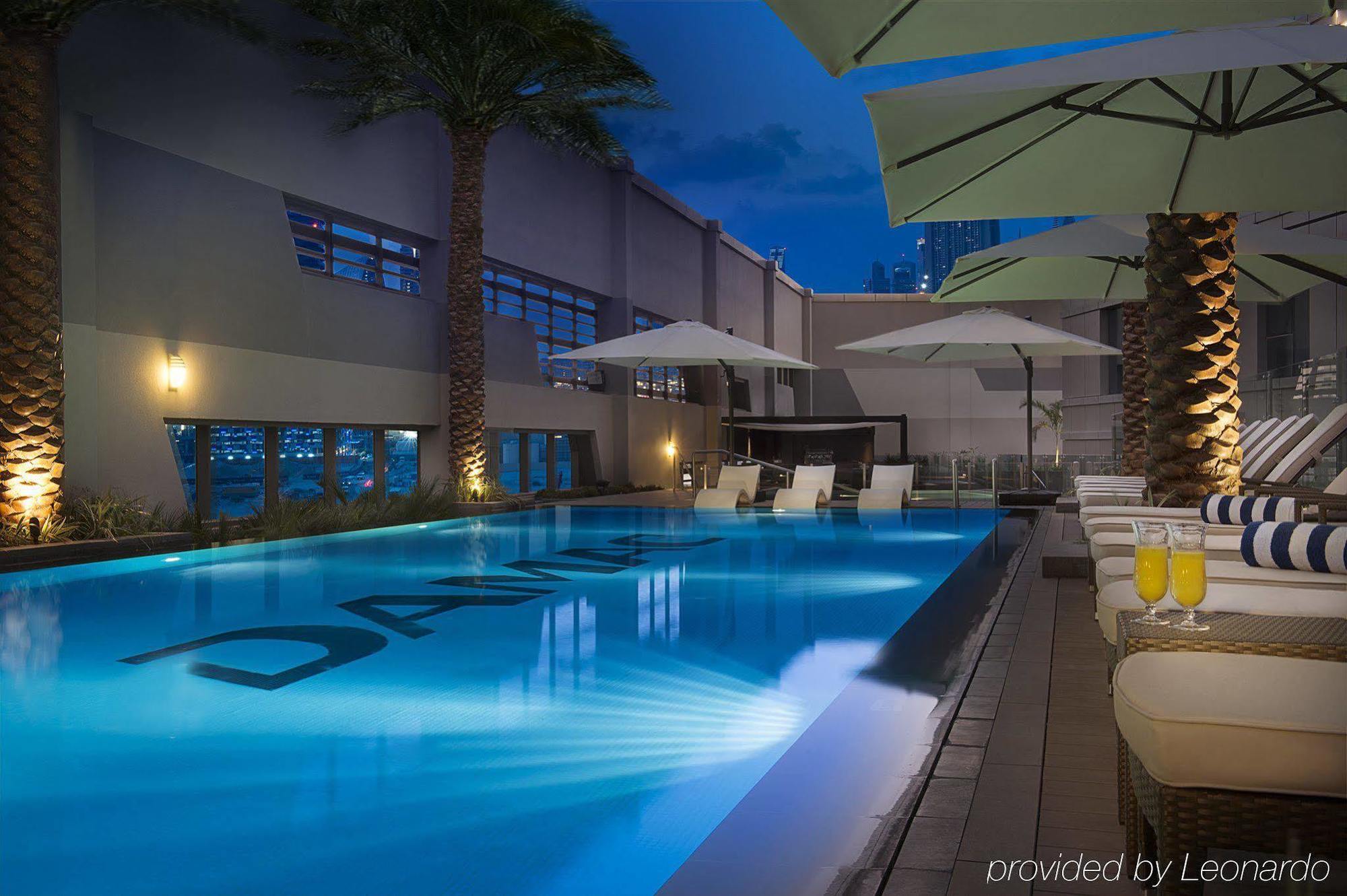 Damac Maison The Vogue Dubai Exteriör bild The pool at the hotel