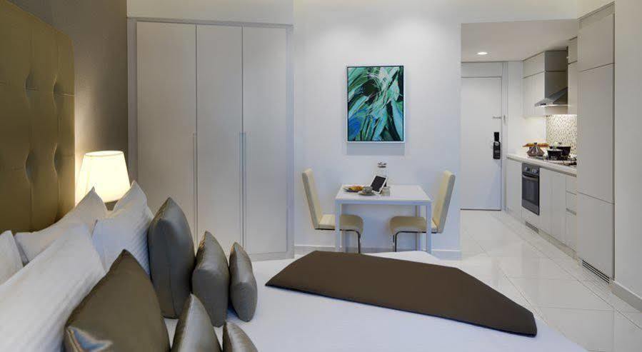 Damac Maison The Vogue Dubai Exteriör bild A typical apartment interior