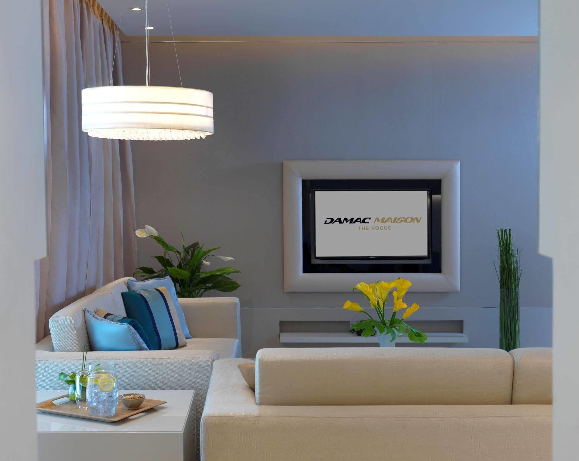 Damac Maison The Vogue Dubai Exteriör bild A living room at the hotel