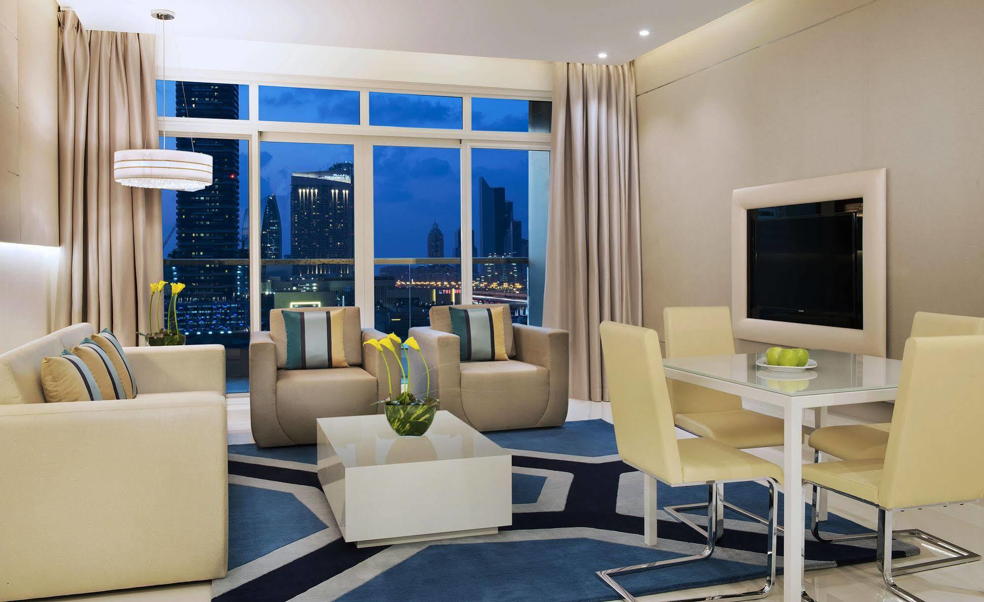 Damac Maison The Vogue Dubai Exteriör bild A living room in a typical apartment