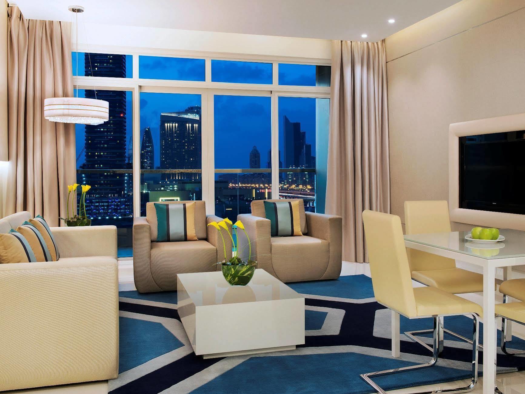 Damac Maison The Vogue Dubai Exteriör bild A living room in a typical apartment