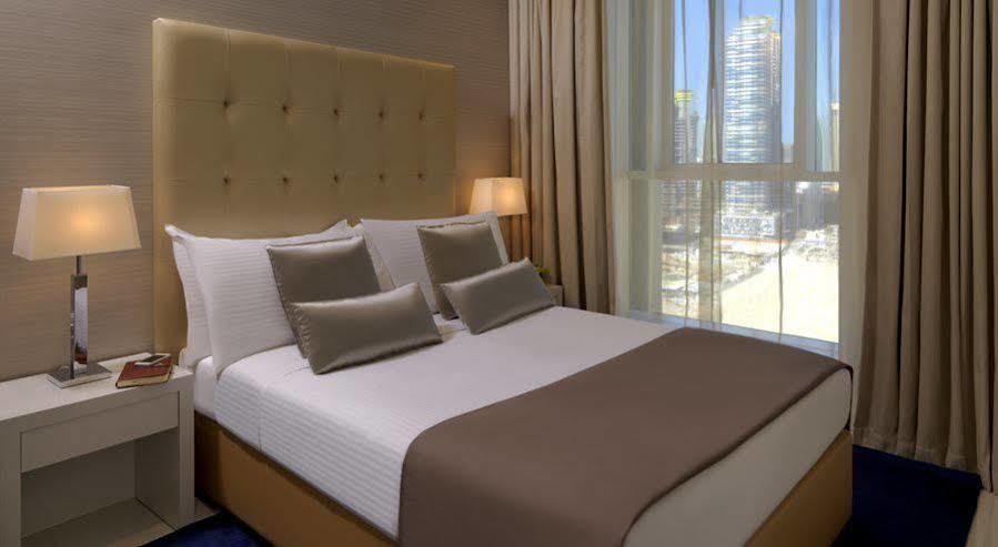 Damac Maison The Vogue Dubai Exteriör bild A bedroom